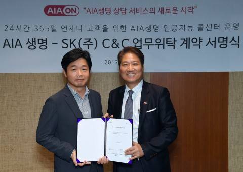 이기열 SK C&C ITS 사업장(좌)과 김대일AIA생명 운영본부장(우). 인공지능 콜센터 서비스 업무 위탁 체결식 